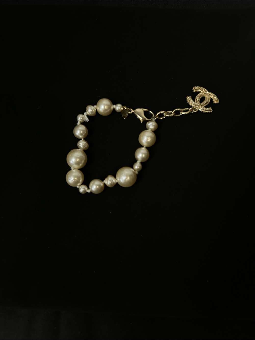 CHANEL Gold and Ivory Pearl Bracelet with CC Pendant